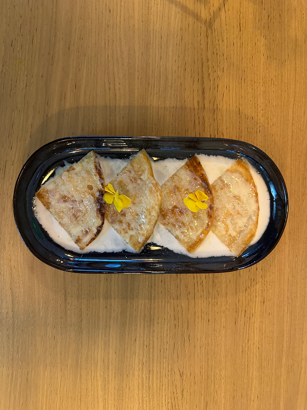 Crispy paratha with sweet condensed coconut milk image