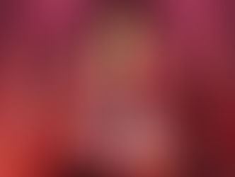 A promotional poster featuring Kim Kardashian. She is styled in a vintage, glam aesthetic with dark hair in a sleek wave, wearing a tailored, deep red suit jacket. The background is a mix of deep red and pink arched shapes. Text reads "KIM KARDASHIAN" at the top, and in large white letters: "hulu ALL'S FAIR IN LOVE" at the center.