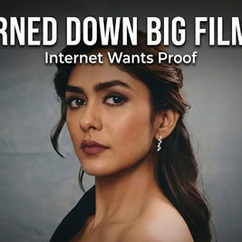 A portrait of actress Mrunal Thakur against a soft, dark gray backdrop. She is looking directly at the camera with a serious, composed expression. Her hair is styled in loose waves, partially pinned back, and she wears elegant, shimmering drop earrings. The image features bold white text at the top that reads "TURNED DOWN BIG FILMS?" in all caps, with a smaller sub-headline below it stating "Internet Wants Proof."