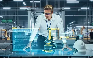 robotics-engineer-working-robot-arm-822932997.webp