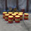 Thumbnail: Dented Oil Drums - RED with YELLOW stripe and lids - Pack of 10