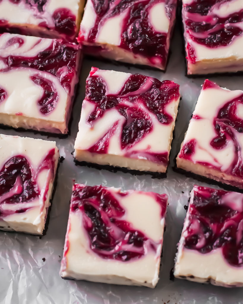 Berry swirled cheesecake bars