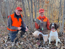 clients with their gun dog springer