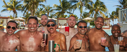 a row of men with diverse backgrounds pony up to the Dive Bar at the Hard Rock Vallarta Mexico