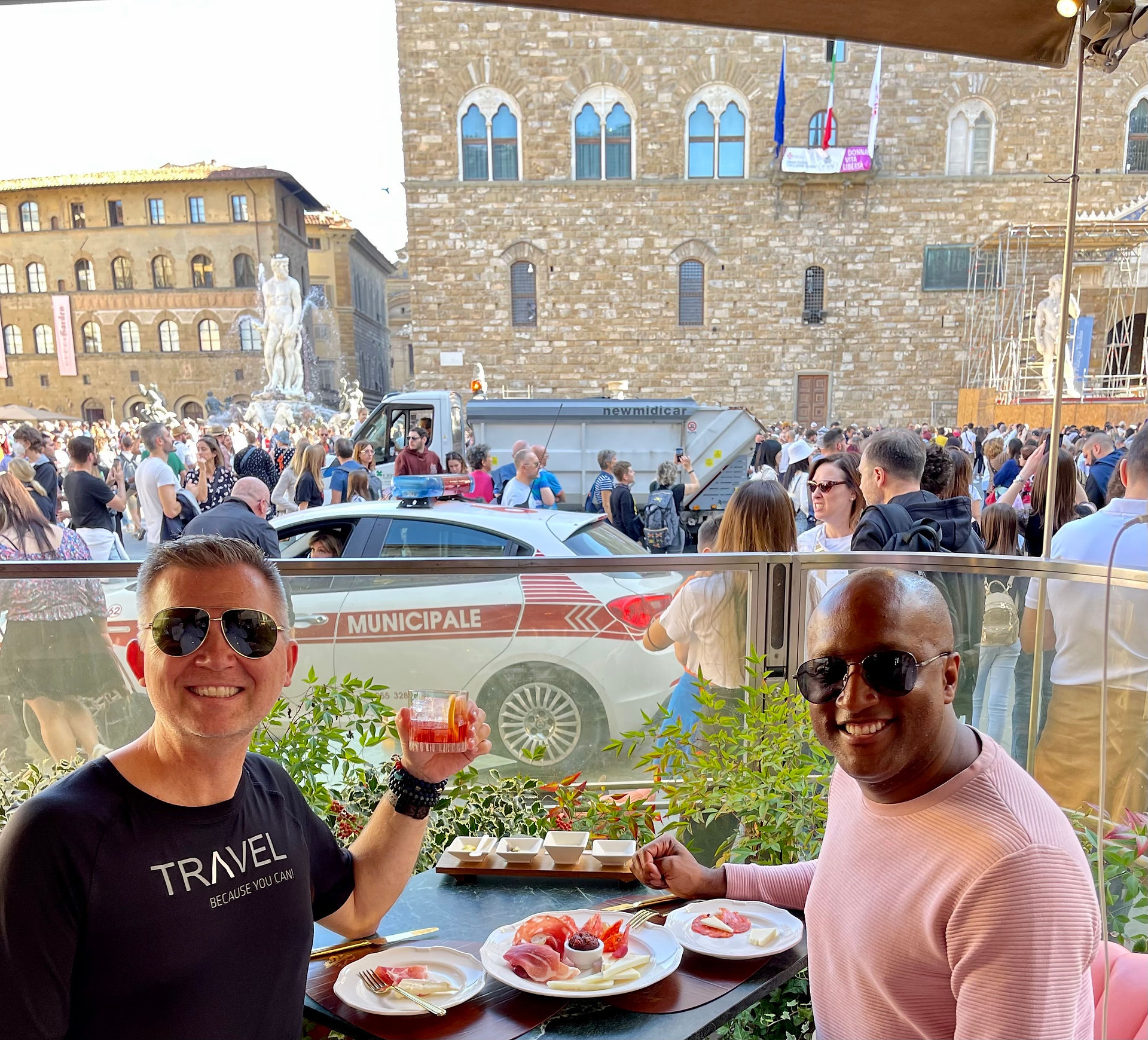 sitting in a square in Florence Italy