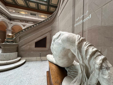 Paul Emmanuel: Untethered
2024
MFA thesis installation in the main building court of Maryland Institute College of Art, Baltimore MD, USA.
Part of Grad Show 3, Mount Royal School of Art (Multidisciplinary MFA) 2024 thesis group exhibition, curated by Professor Luca Buvoli.
Decommissioned, model T-10, US military personnel parachute with severed suspension lines, detached harness with risers, 550 para-cord. High-definition video projection, stereo soundtrack (8 min 7 sec).
Parachute diameter: 35 feet
Harness dimensions: 30 x 30 inches (excluding suspension lines).