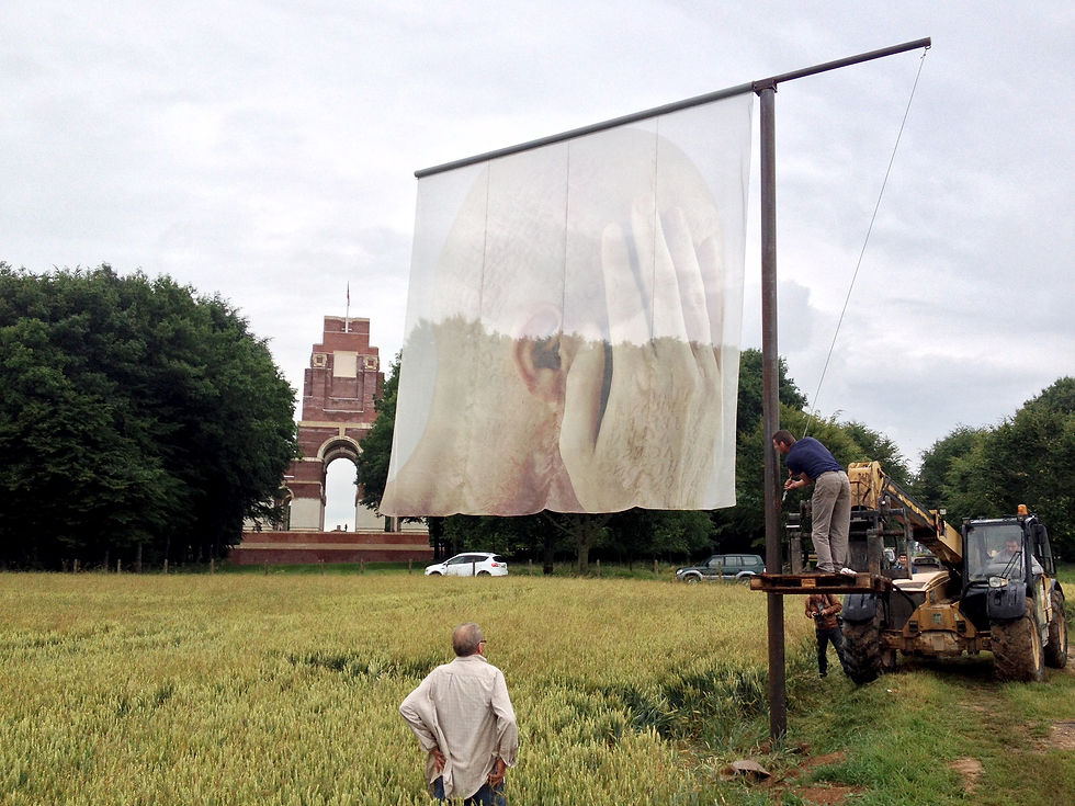 Rows of steel supports and translucent banners during the installation of Paul Emmanuel’s The Lost Men France near Thiepval, France, 2014.