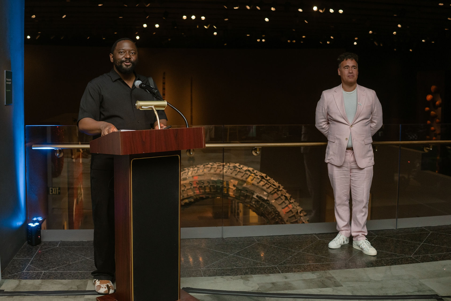 A speaker addresses guests during the opening programme for Here: Pride and Belonging in African Art at the Smithsonian National Museum of African Art.