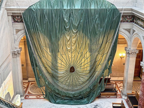 Untethered
2024
Installation view of Untethered in the main court at Maryland Institute College of Art, Baltimore, MD, USA
Decommissioned, model T-10, U.S. military personnel parachute with severed suspension lines, detached harness with risers, 550 para-cord.
High-definition video projection, stereo soundtrack,
7 min 26 sec. Parachute diameter: 35 feet.
Harness dimensions: 30 x 30 inches (excluding suspension lines)