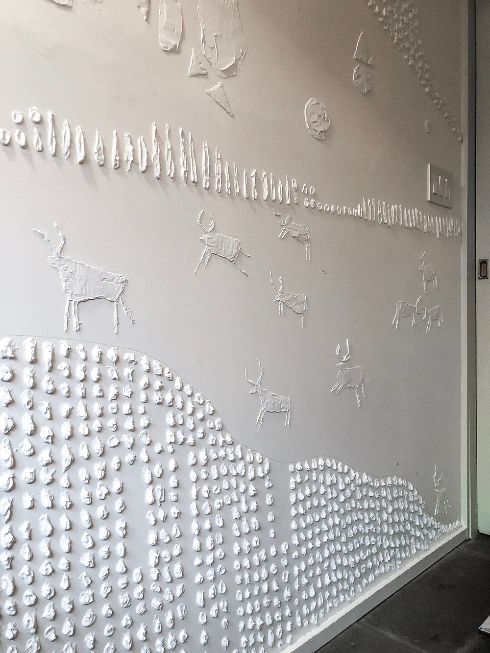 Textured mural on drywall using drywall putty