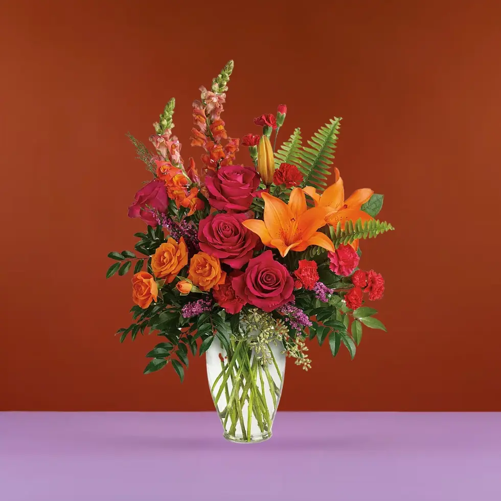 Punch of Color Birthday Bouquet with roses, lilies & lush greens. Vibrant floral gift in Oceanside & East Rockaway, NY.