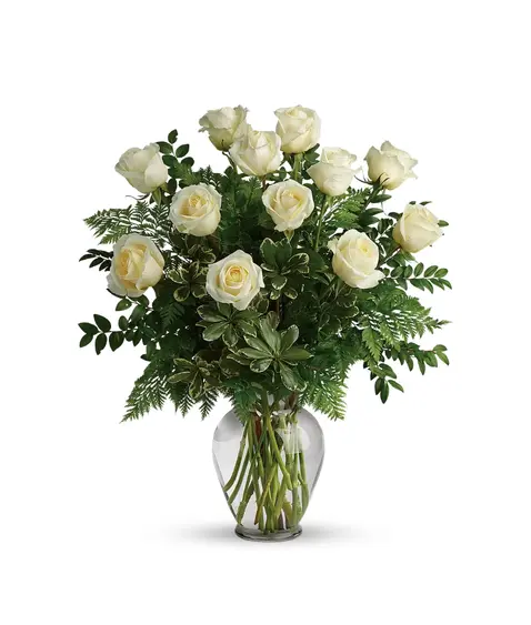 tweleve white roses in a crystal clear vase