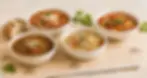 Assorted Italian soups served in white bowls at Mulberry Street Italian Food Center in Brick