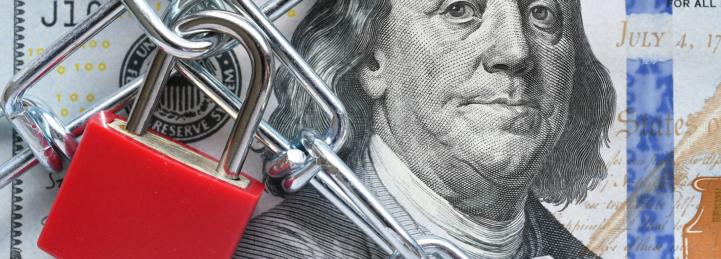 lock-and-chain-on-cash-money-restrictions-frozen-a-2025-03-11-18-15-34-utc.jpg