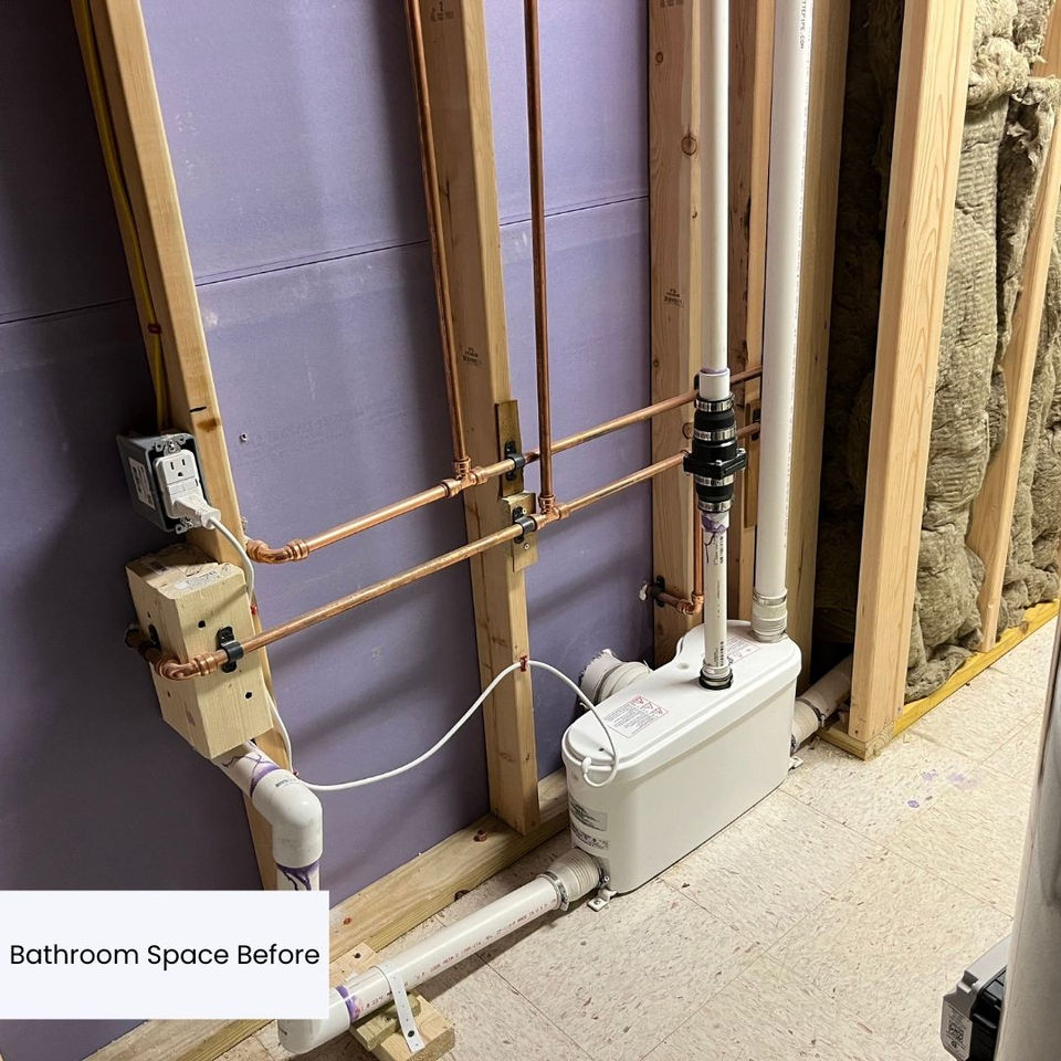 old bathroom with pipes exposed