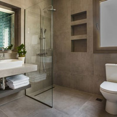 Bathroom showing shower and a sink
