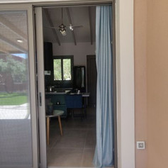 open sliding door to enter the house from the back site.