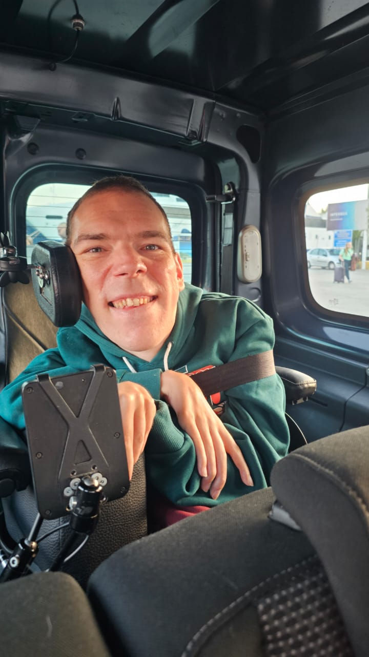 A wheelchair user in an accessible car