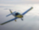 Bristell light sport aircraft flying above the clouds during a training flight with Lumina Aviation near Chicago.