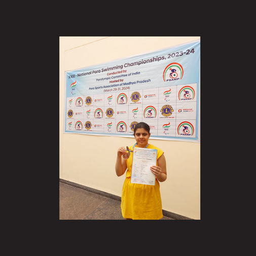 Sanika winning bronze medal in free style swimming 