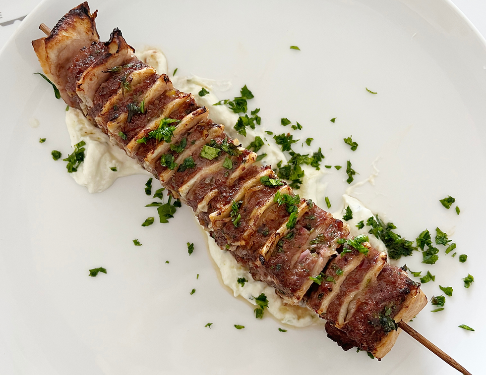 Make these trendy kabobs; layers of seasoned ground beef and four tortillas, finished with lemon evoo honey drizzle and parsley.