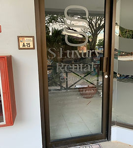 S Luxury Rental office door, Plaza Tamarindo A-15