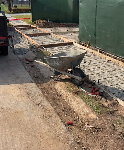 Residential concrete sidewalk under construction