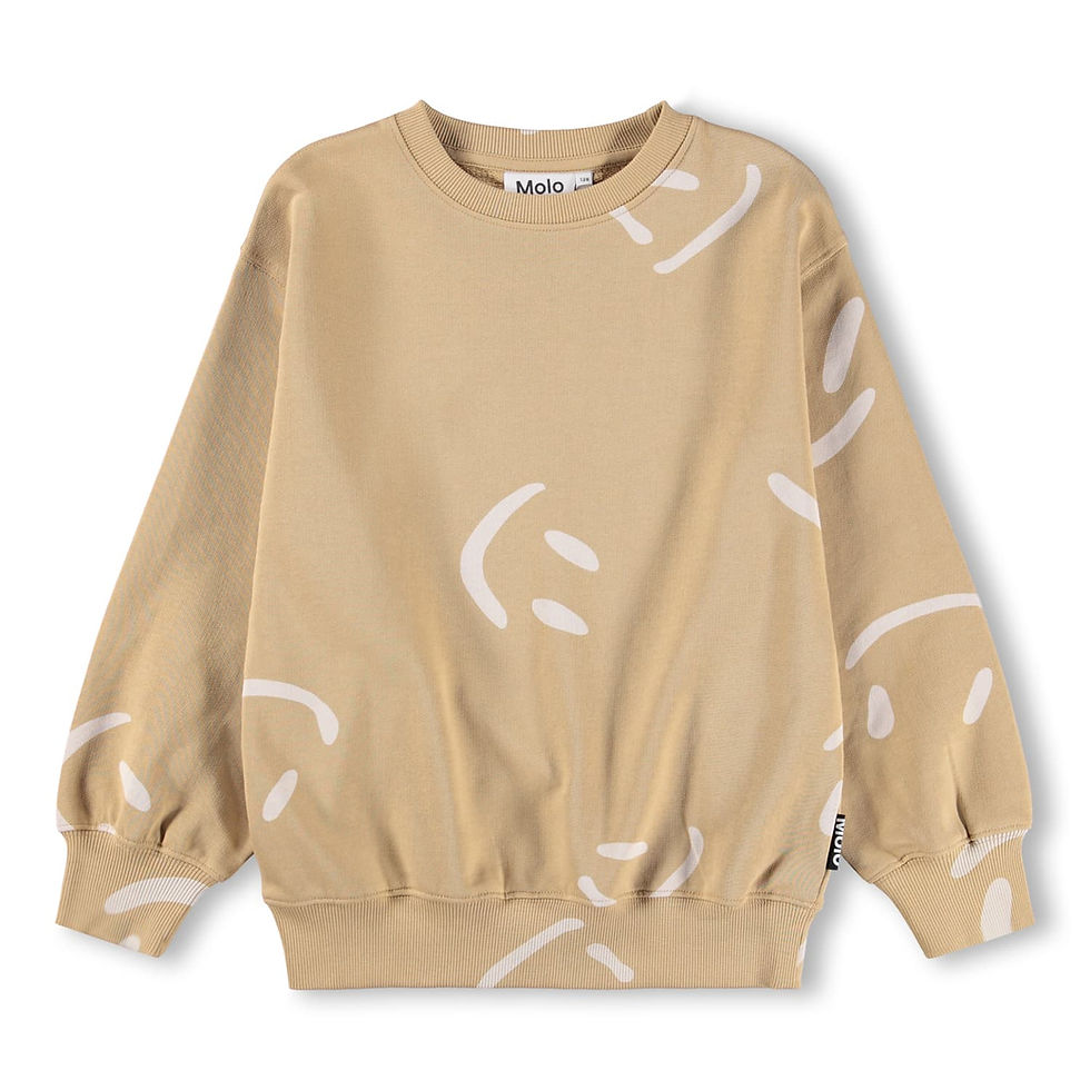 Beige children’s sweatshirt with long sleeves and abstract white smiley-style prints.