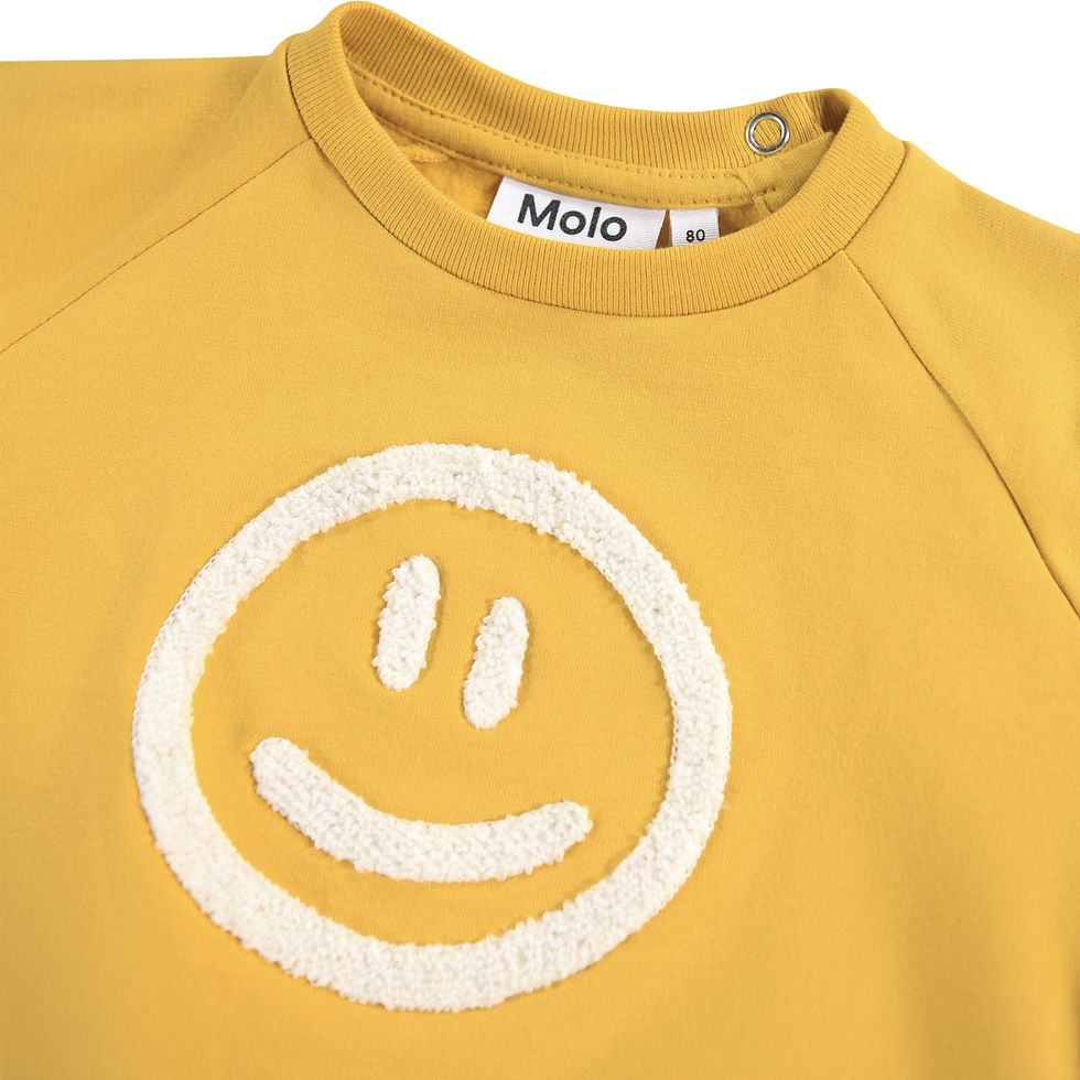 Close-up of the Molo Disc Sweatshirt neckline and embroidered smiley detail
