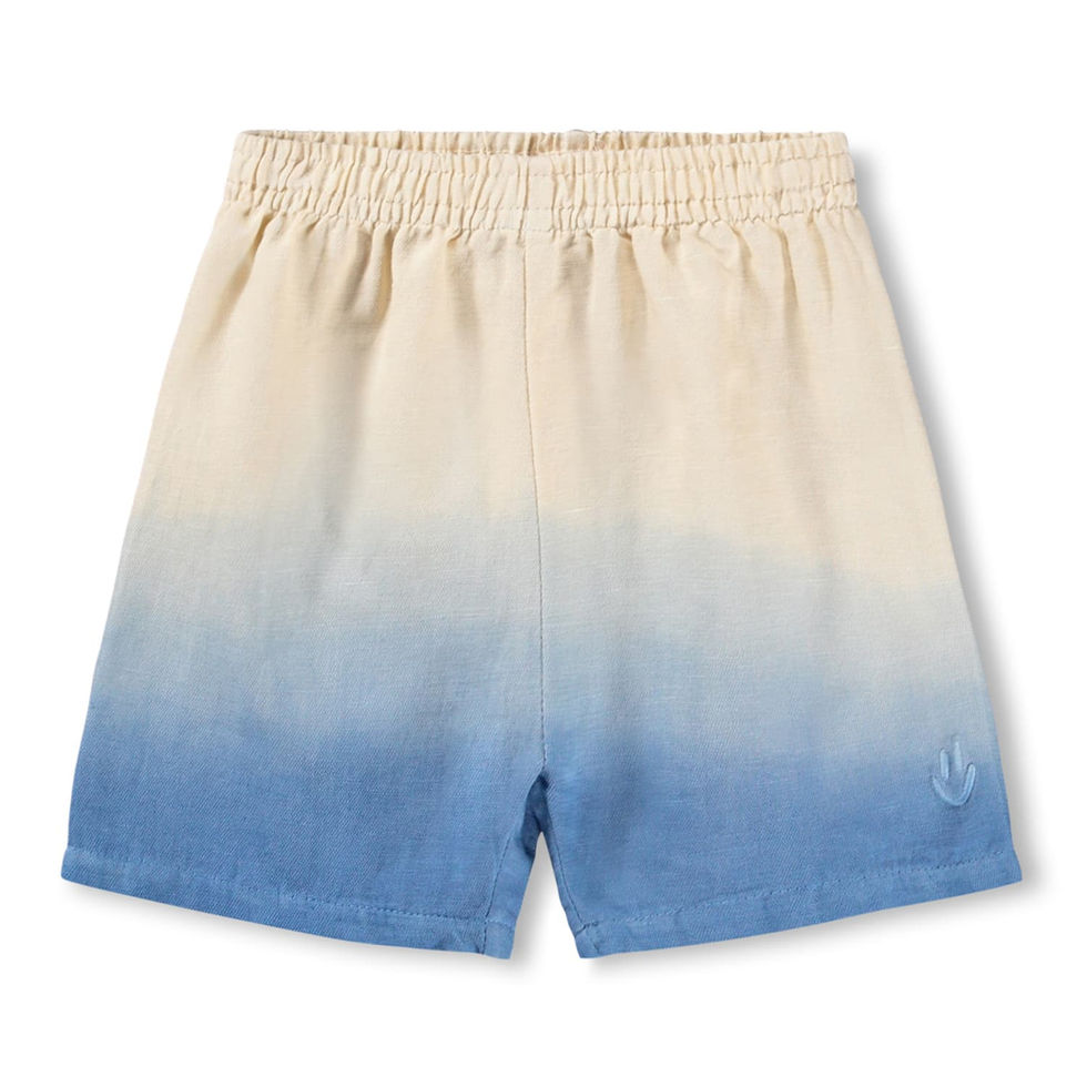 Children’s shorts with a gradient fade from cream to blue and an elastic waistband.