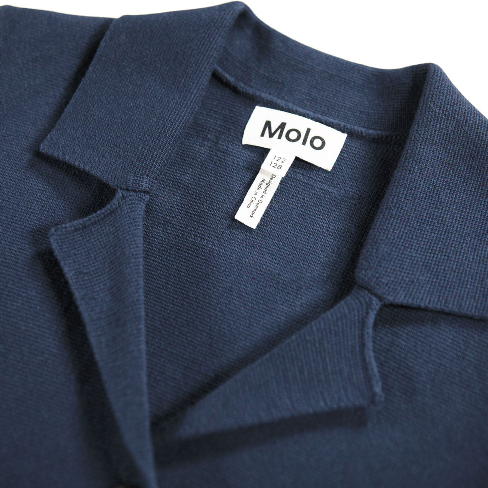 Close-up of Molo Gabriela cardigan collar and label