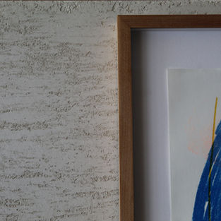 White Travertino plaster behind a painting
