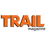 Trail Magazine's logo in orange and black