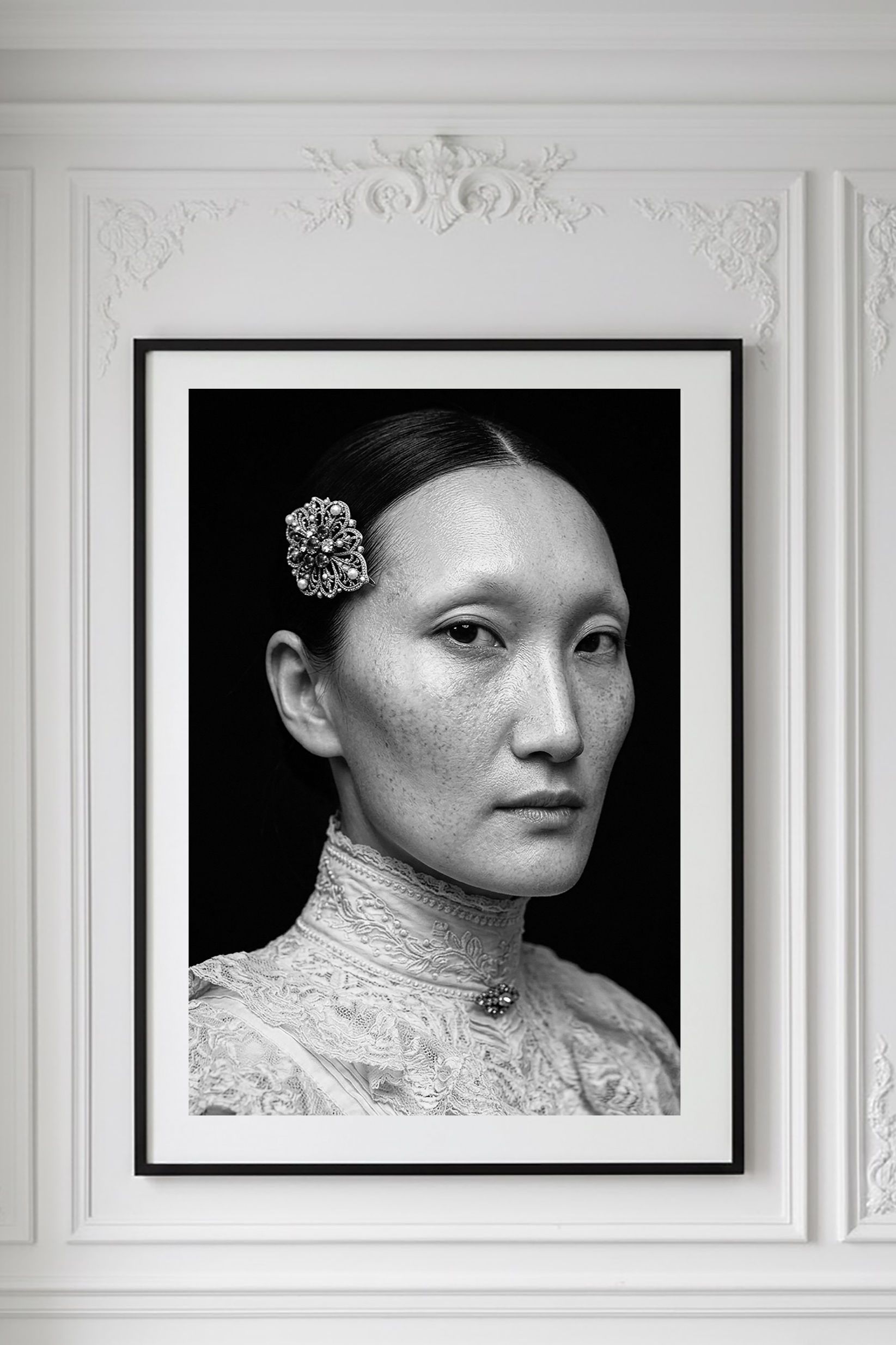 Regina — black-and-white fine art portrait, a woman with an ornament at the hair and an embroidered high collar, by HRÈ