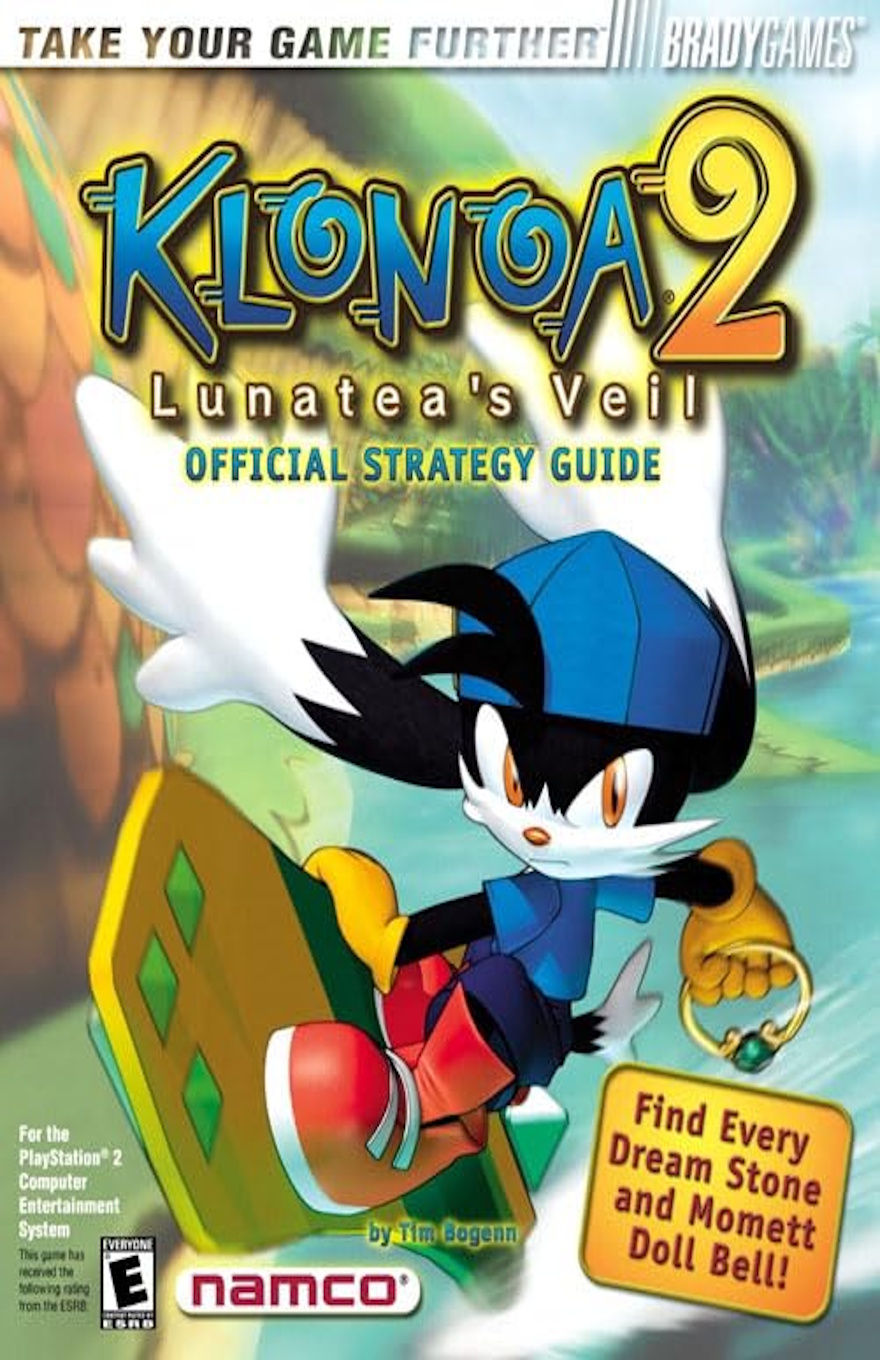 The cover features a black and white animal character with long ears and a hat holding on to a board of some sort while going across some water. With one hand he's gripping the side of the board, and in the other hand he's holding a ring with a green gemstone. There's a cliff on the one side of him and it looks like he's moving across a river or lake.