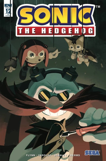 Cover of Sonic The Hedgehog #12 (Nathalie Fourdraine variant) shows Dr Eggman with an evil grin using a screwdriver to put together a model of Sonic. Hanging above him suspended by ropes on the ceiling are a Knuckles model and a Tails model.