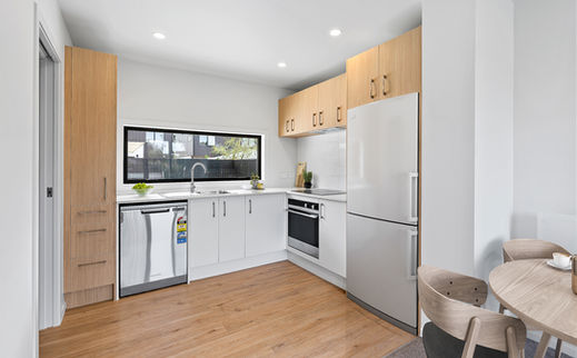 Two Bedroom 60sqm kitchen, laundry to left with ample under the stairs storage.jpg