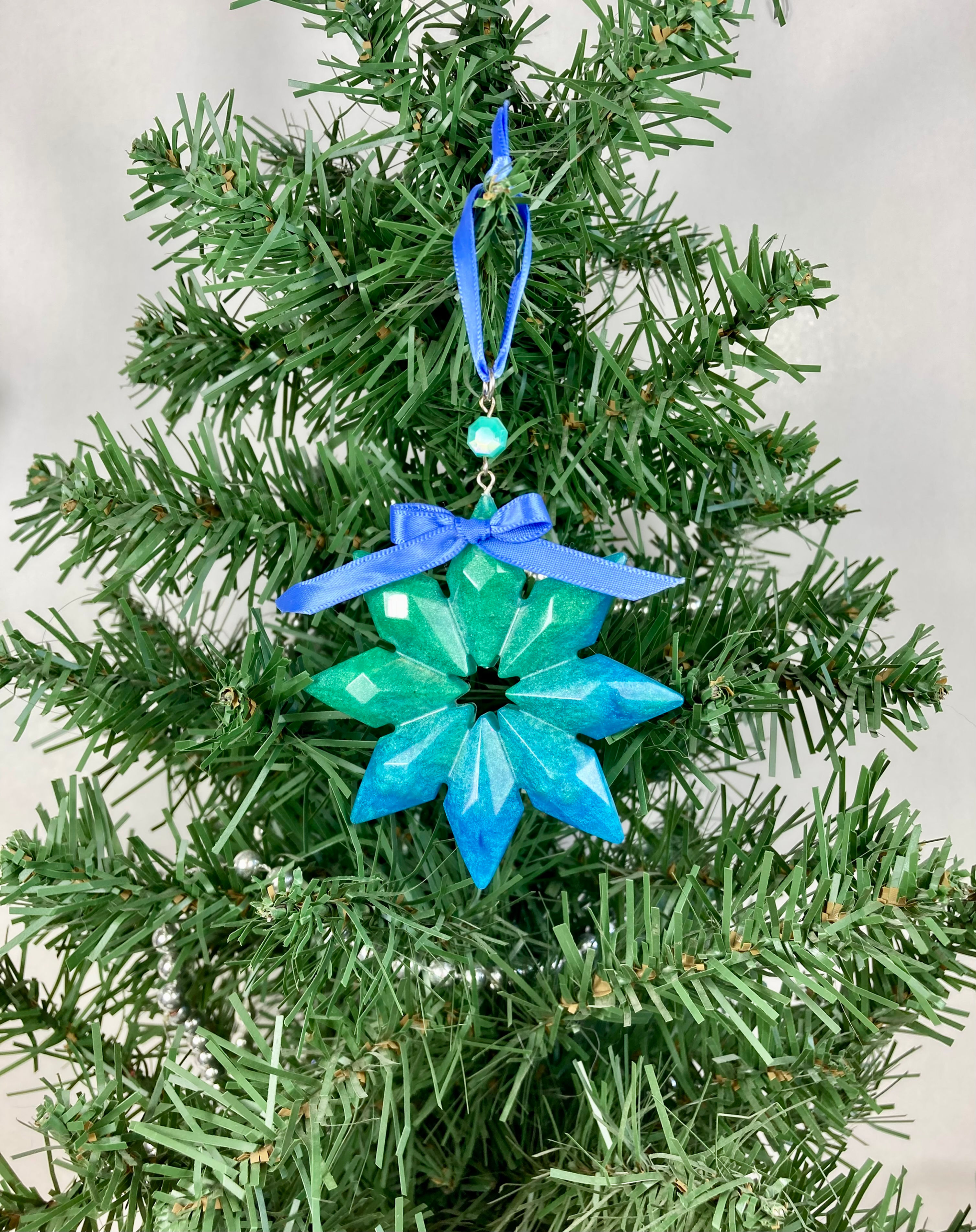 Blue & Green Resin Snowflake Ornament with Glass Bead and Blue Ribbon – Handmade