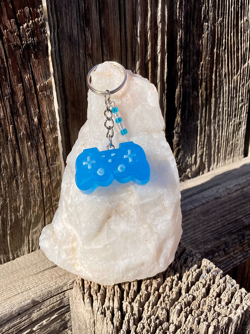 Thumbnail: Glow-in-the-Dark Blue Game Controller Keychain