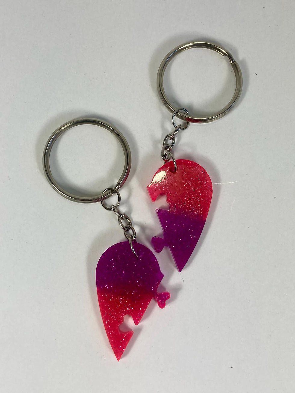 Thumbnail: ​​​​​​​Handmade 2-Piece Heart Keychain – UV Black Light Reactive