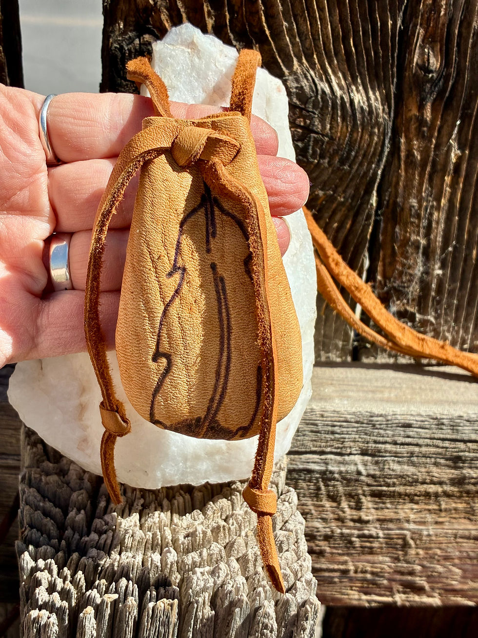 Thumbnail: Handmade Leather Feather Neck Pouch | Hand Burned Feather Design