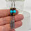 Thumbnail: Handmade Turquoise & Tiger Eye Silver Feather Dangle Earrings