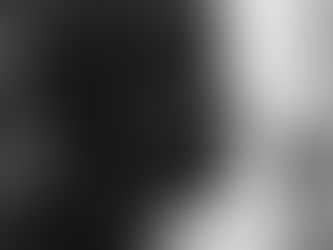 Businessperson standing alone on an empty street, evoking feelings of isolation, burnout, and the emotional impact of toxic leadership and workplace rumors.