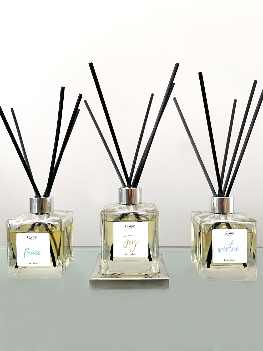 three luxury reed diffusers
