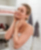 woman-towel-touching-her-face.jpg