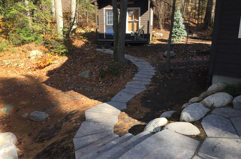 Small flagstone walkway to bunky