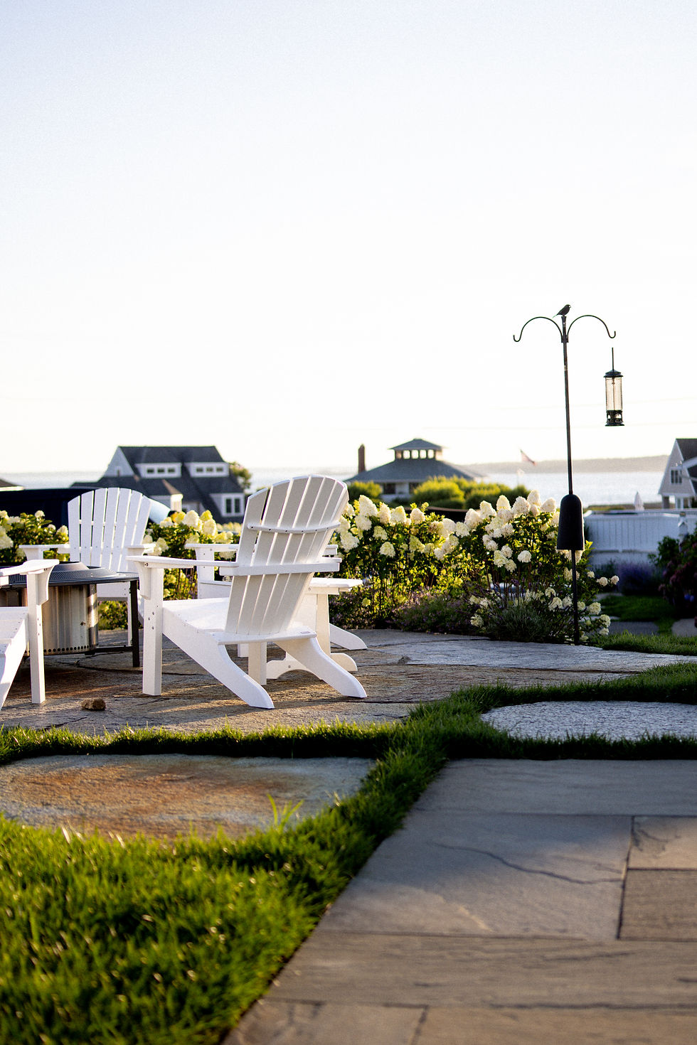 Adirondack chairs on a coastal lawn, Newport, Rhode Island