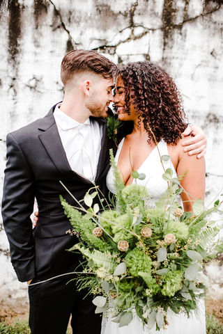 Bride-and-Groom-Looking-Into-Each-Other's-Eyes.jpg
