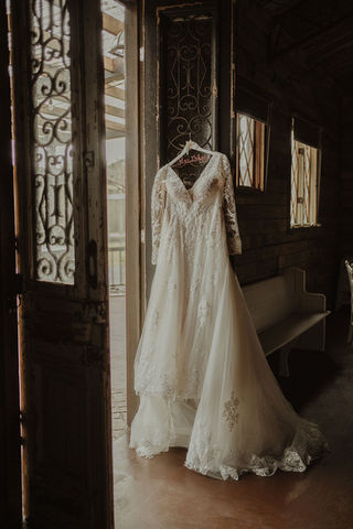 Bridal-Gown-Hanging-in-Doorway.jpg