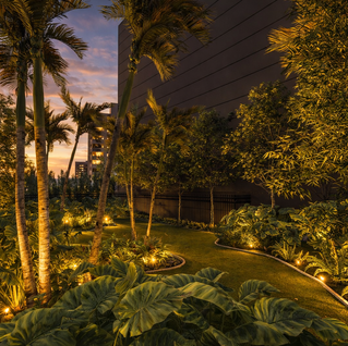 Detalhe de ambiente residencial com destaque para iluminação quente, materiais naturais e design arquitetônico elegante e acolhedor.